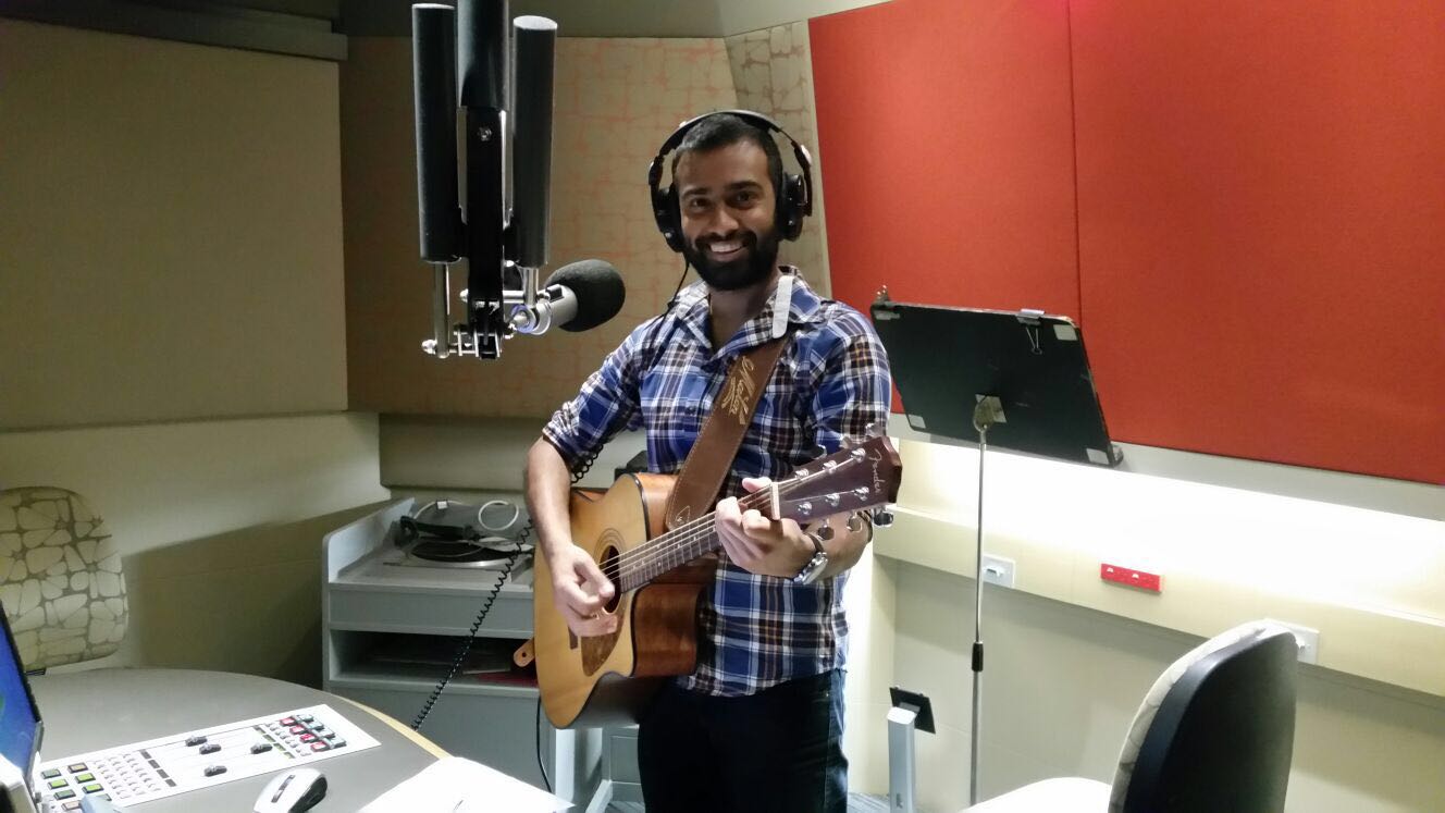 Dr Niraj Lal recording songs for ABC Education