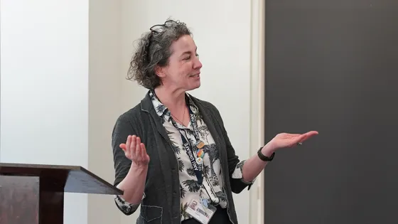 Laura Dawes speaking during a seminar