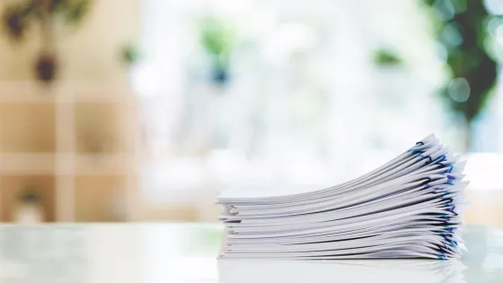 Stack of papers with paper clips