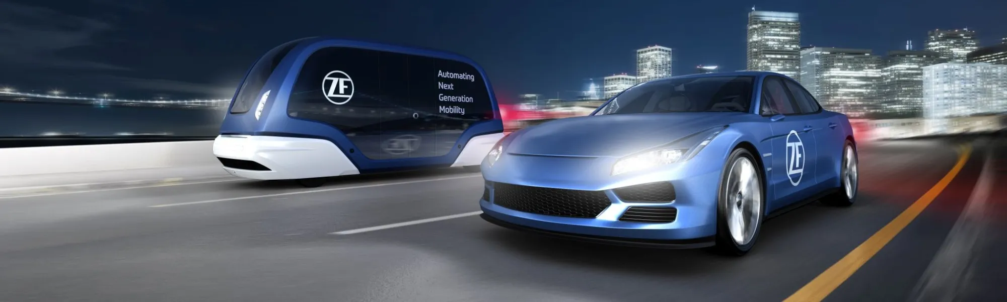 A car and a van driving fast on the highway into two different lanes.