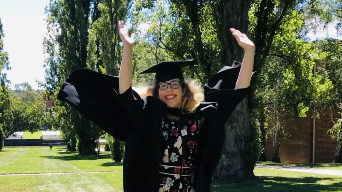 A student in graduation gown