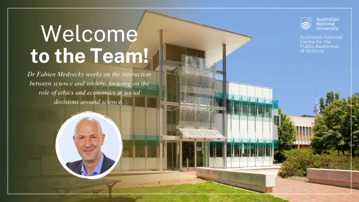 Image of a glass building with smaller circular image of a headshot of a man and white text on the left side that reads, "Welcome to the Team"