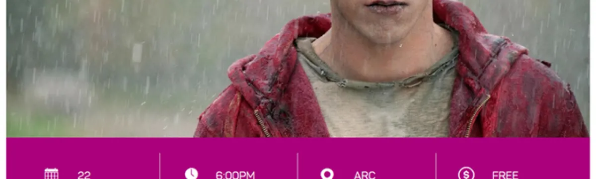 A man zombie standing in the rain. Text at the top is movie title, "Warm Bodies" with event details at the bottom in pink.