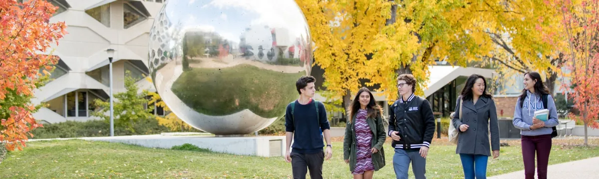 Some students walking on a footpath