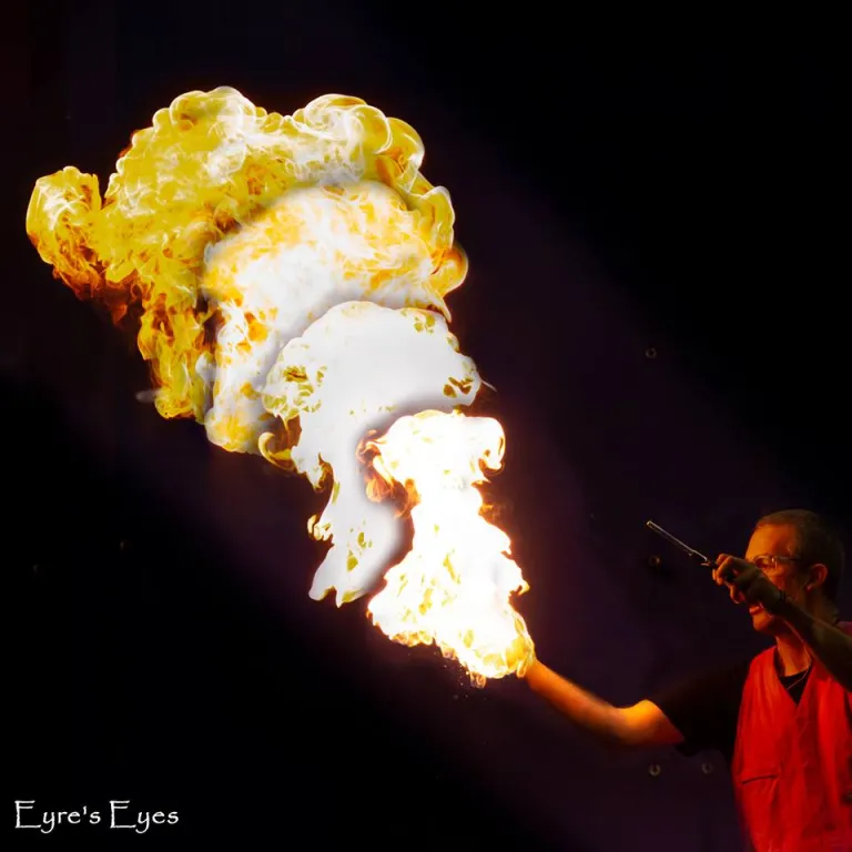 Graham blowing fire, photo for Eyre's Eyes