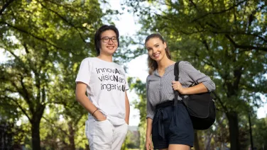 Students smiling at the camera