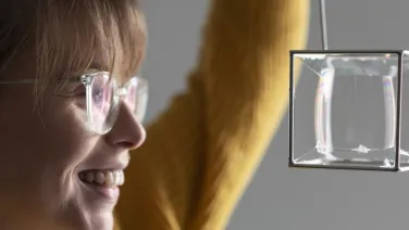 A lady looking at a bubble