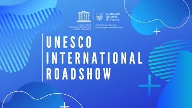 Blue slide with bubbles randomly scattered on the outside of the image. White text in the middle reads 'UNESCO International Roadshow'